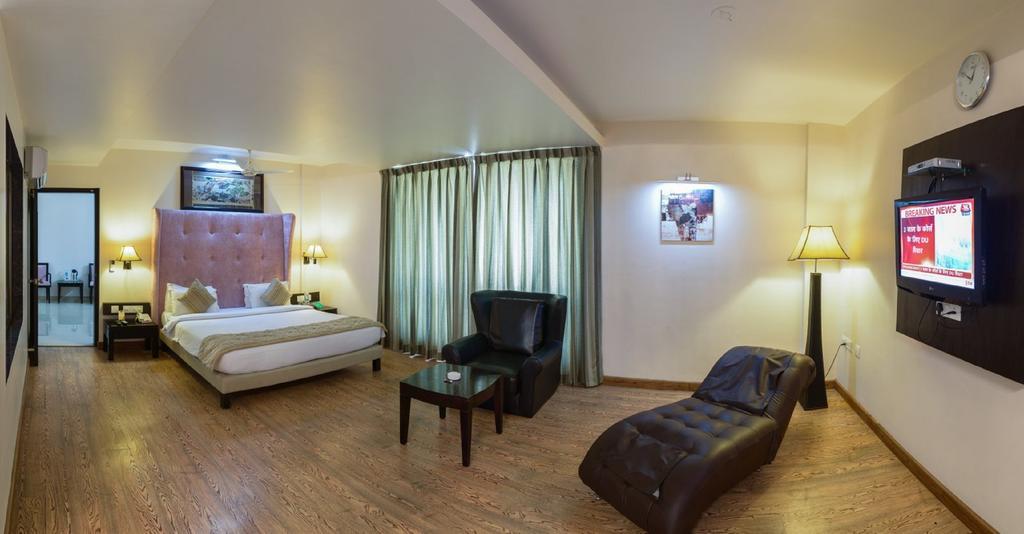 Quality Inn Palms Gandhidham Bilik gambar